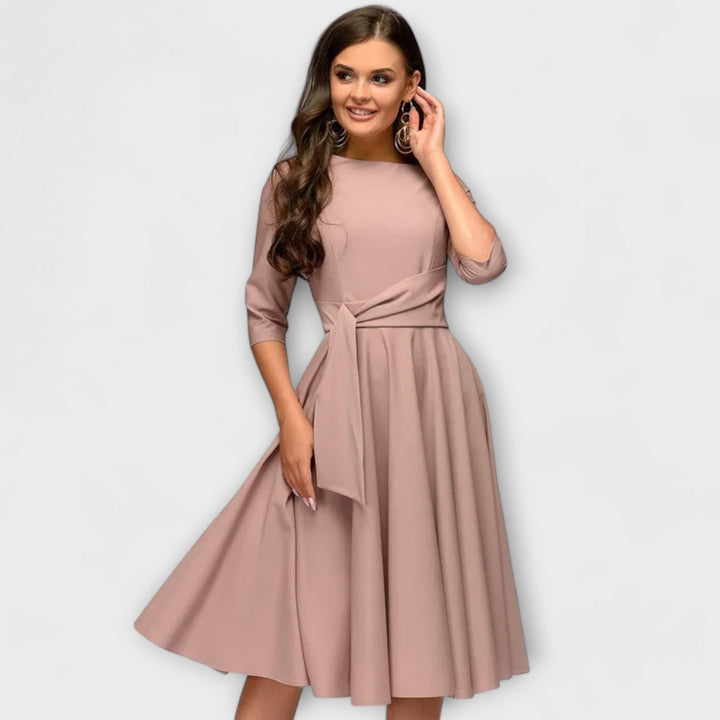 Ana - Elegancka sukienka midi z kokardą w talii