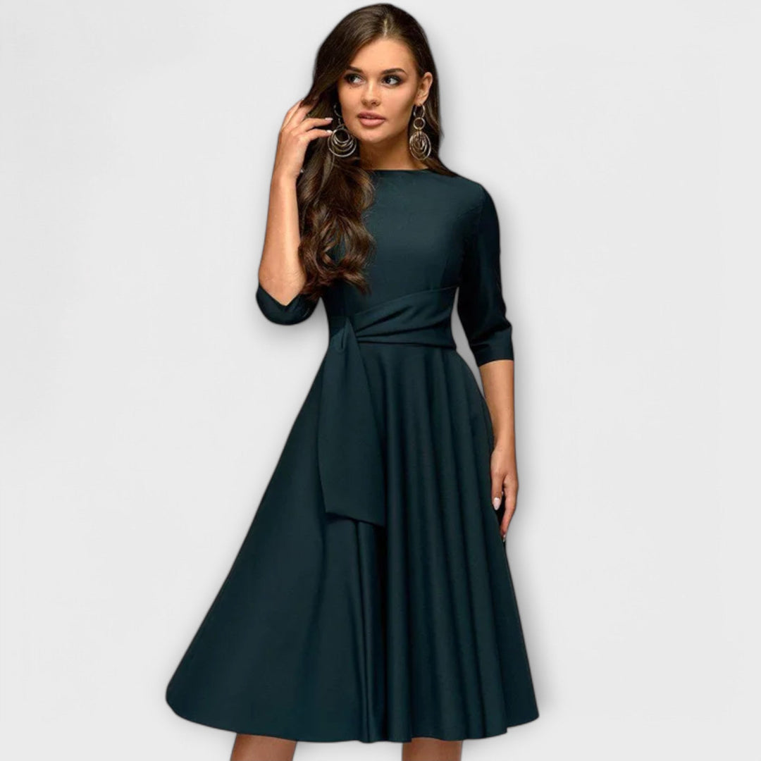 Ana - Elegancka sukienka midi z kokardą w talii