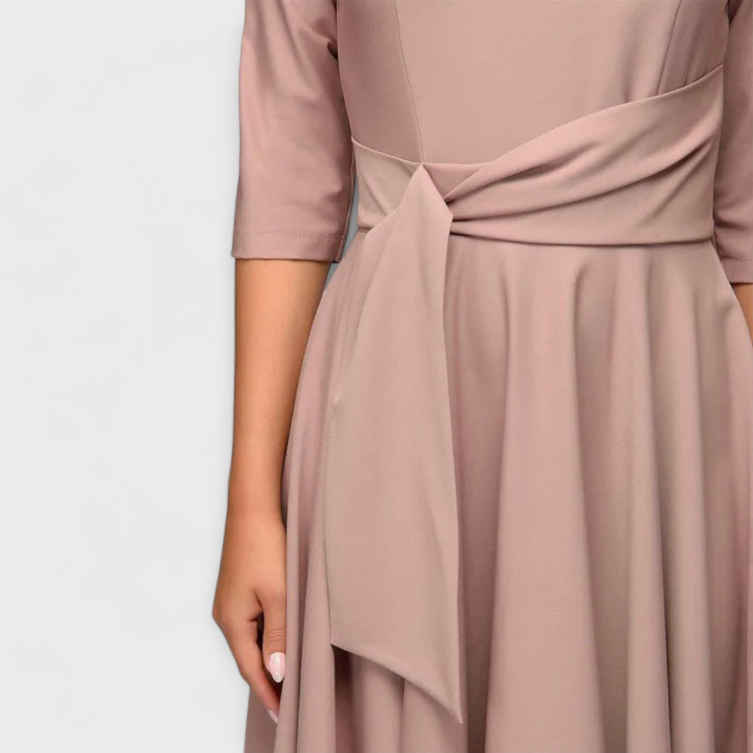 Ana - Elegancka sukienka midi z kokardą w talii