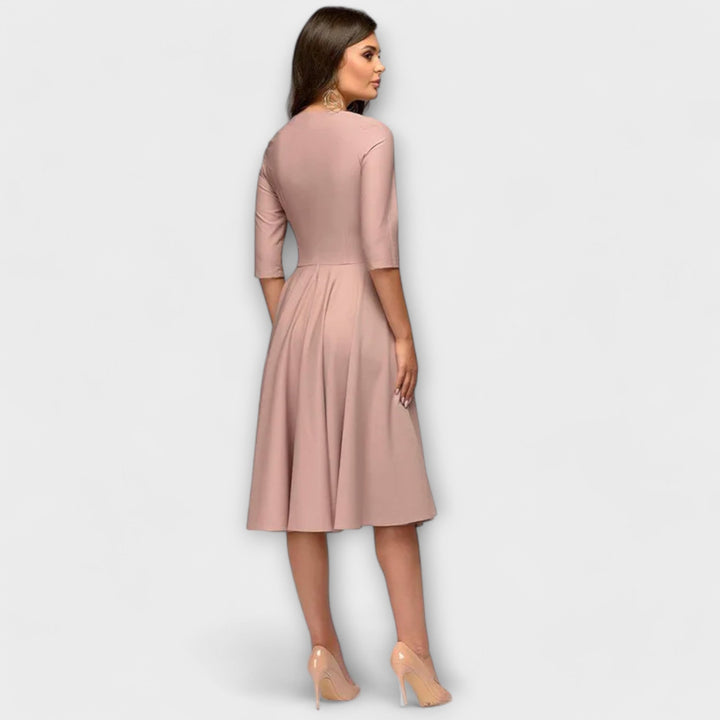 Ana - Elegancka sukienka midi z kokardą w talii